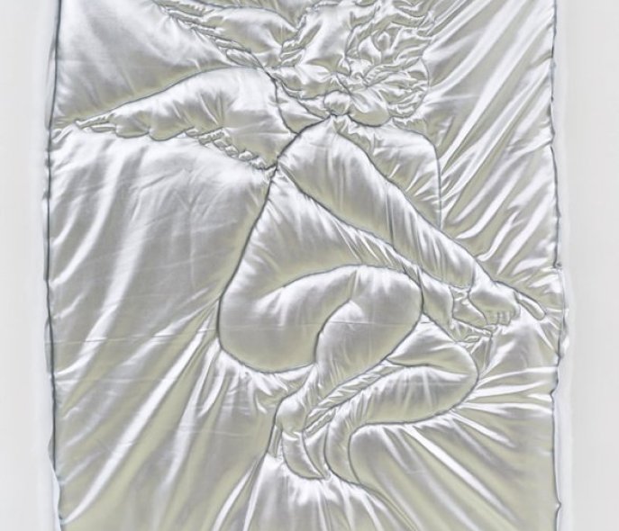 An angel embroidered on fabric