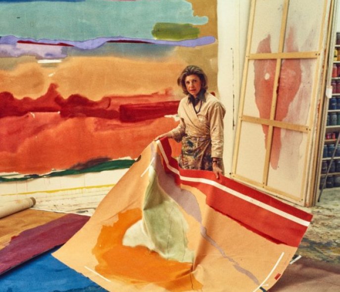 Helen Frankenthaler holds one of her works