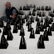 Ligeti during a performance of Poème symphonique for 100 metronomes, © Photo : Paul Sacher Stiftung, Basel Ligeti during a performance of Poème symphonique for 100 metronomes, © Photo : Paul Sacher Stiftung, Basel