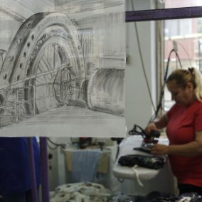 Drawing of a machine and a woman ironning