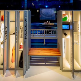 You can see changing room lockers that are built into the exhibition